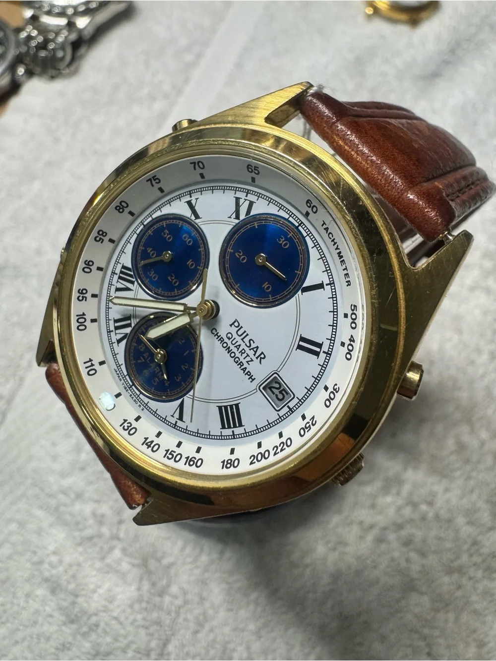 Pulsar Gold Case Watch with White Dial and Blue Subdials
